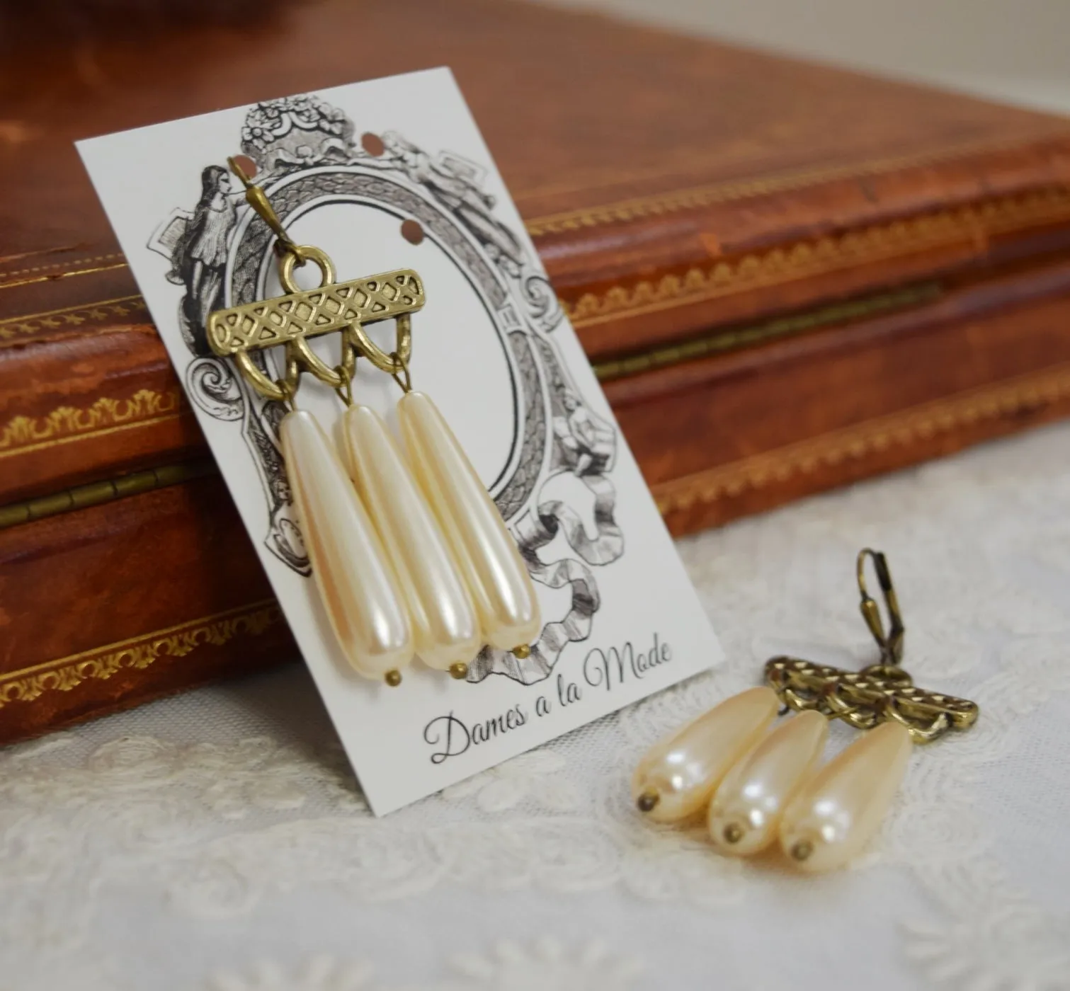 Classically-inspired Triple Pearl Earrings