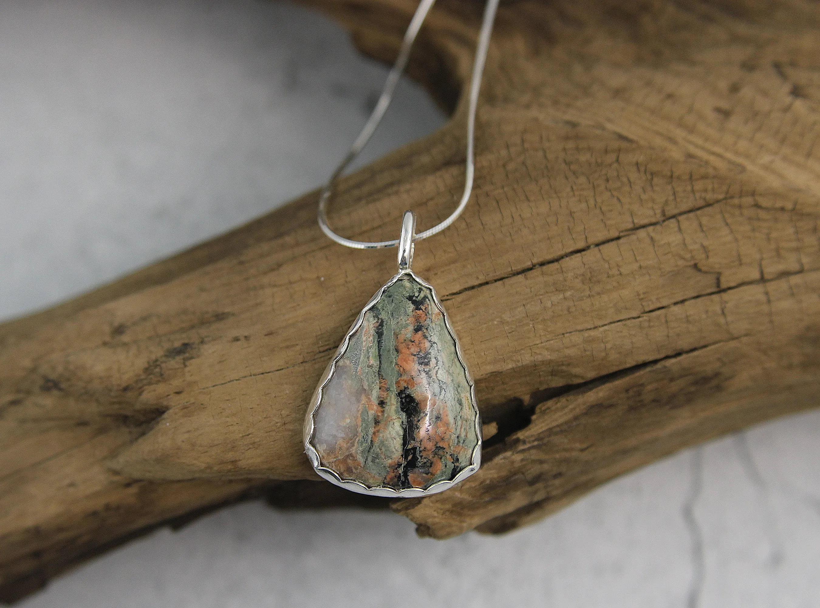 Handmade Triangular Stone Pendant Necklace | Chatham County, NC | Unique Green, Black, and Orangey Red Design