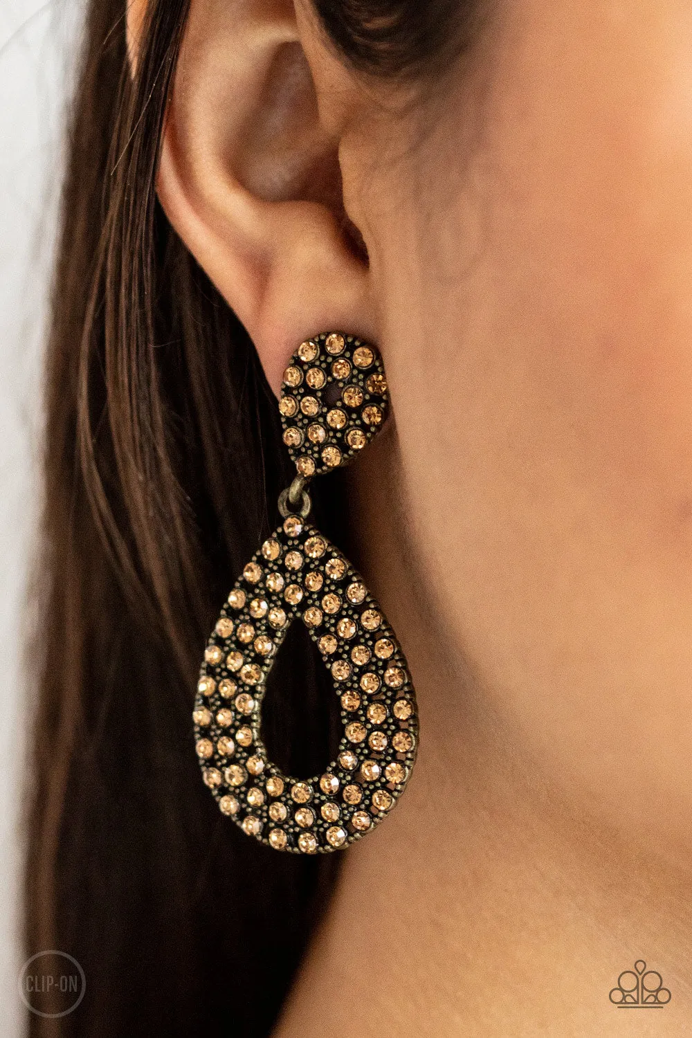 Pack In The Pizzazz - Brass Clip-On Earrings